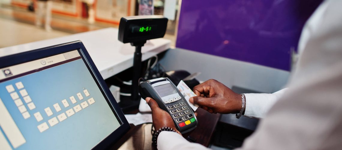 medium-vecteezy_african-american-bartender-at-bar-uses-a-credit-card_10445824_medium